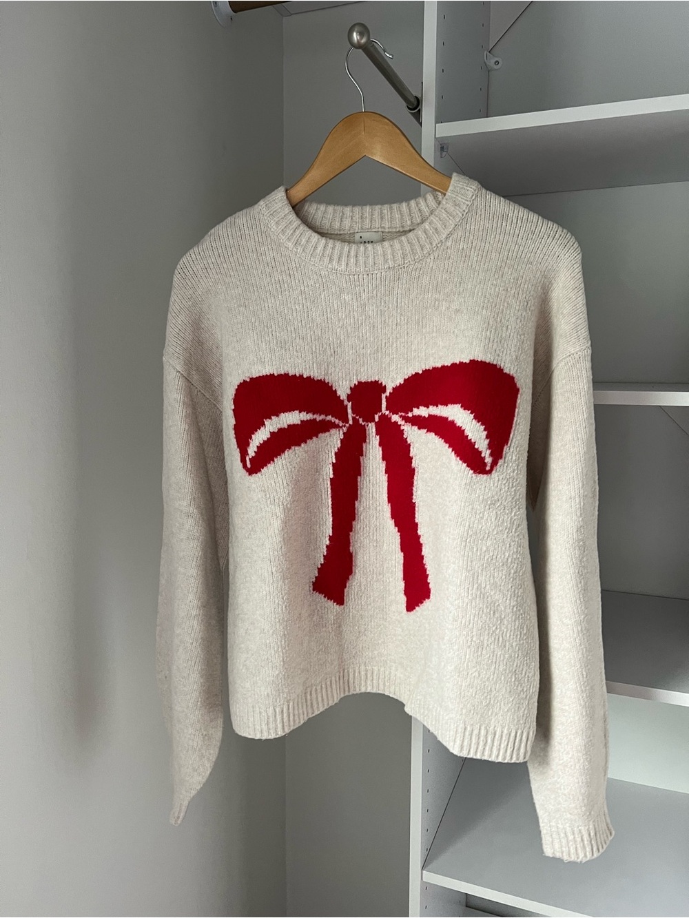 a new day Cream Crewneck Sweater with Red Bow Motif